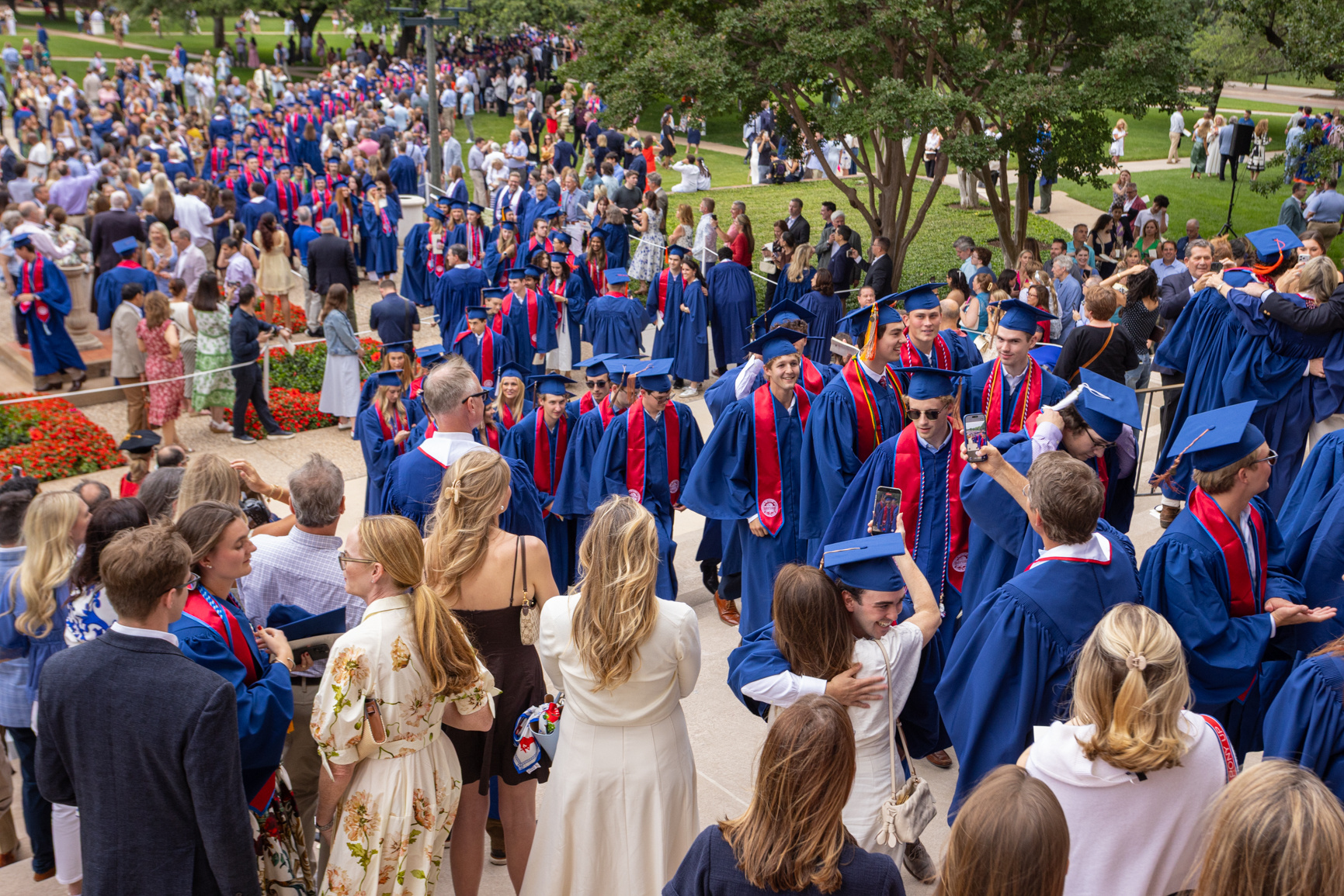 Students proceed to Dallas Hall as part of the ceremonial Baccalaureate and Rotunda Recessional event that marks the symbolic completion of students baccalaureate degrees. Series produced for Southern Methodist University marketing material, 2026.